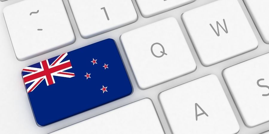 Teclado de laptop con bandera de nueva zelanda